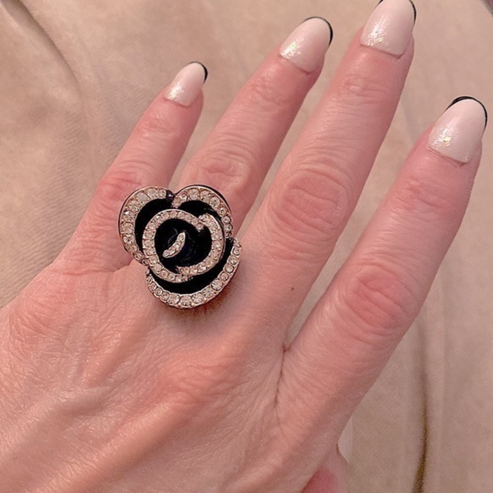 Magnificent navy blue  floral cocktail ring w/ rose gold accents & CZ stones.